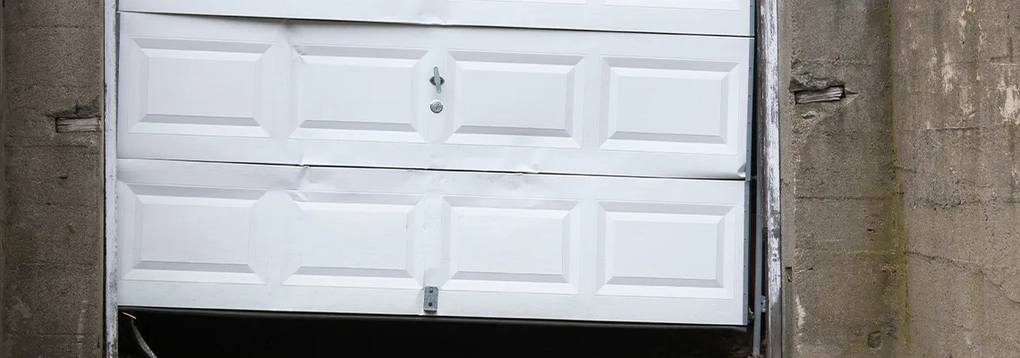 Garage Door Got Hit By A Car Dent Removal in Woodstock, IL