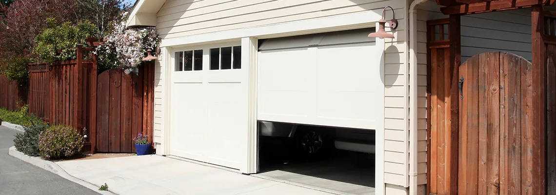 Fix Metal Garage Door Jerking in Woodstock, Illinois